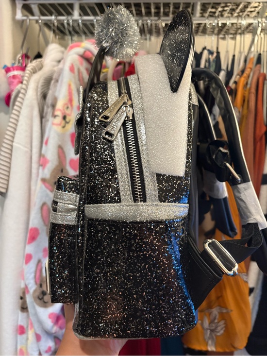 glitter mini backpack Mickey Mouse Sequin Convertible & Crossbody Bag Get that Disney look with a touch of magic introducing the Disney Minnie Mouse Sequin Holographic Loungefly Backpack Mini Glitter Rainbow Backpack